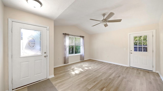 3416 6th St, Elkton, FL 32033 - entryway with light wood-type flooring, a ceiling fan, lofted ceiling, and healthy amount of natural light