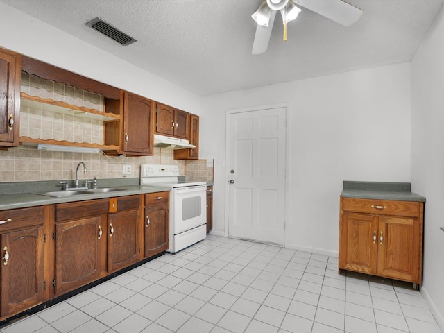 kitchen featuring backsplash, white electric range oven, ceiling fan, sink, and light tile patterned floors