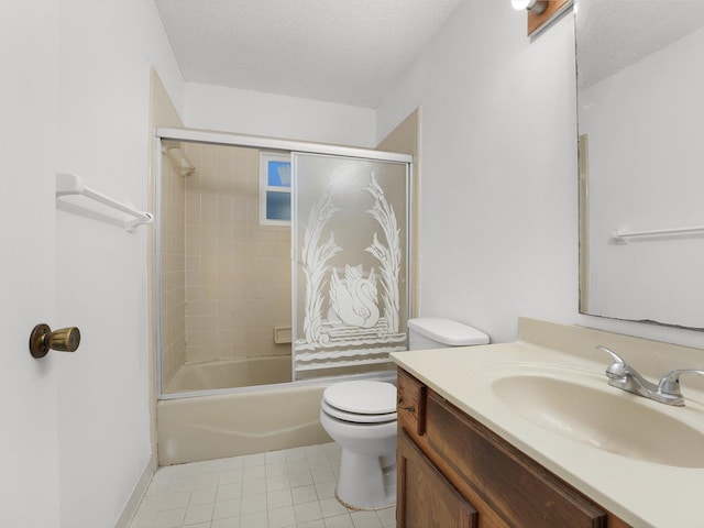 full bathroom featuring shower / bath combination with glass door, vanity, a textured ceiling, and toilet