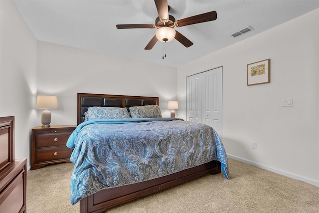 121 Sawmill Forest Ct, Saint Augustine, FL 32086 - bedroom with visible vents, a ceiling fan, carpet, and a closet