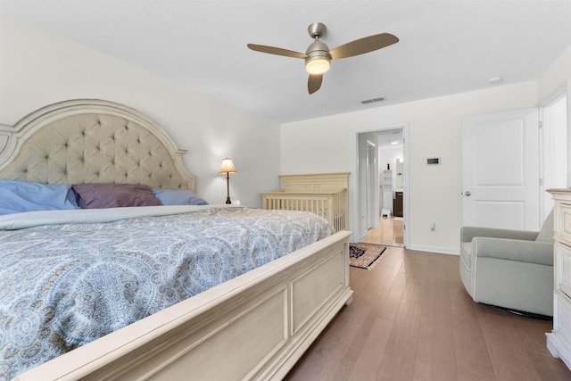 121 Sawmill Forest Ct, Saint Augustine, FL 32086 - bedroom with a ceiling fan, baseboards, visible vents, and wood finished floors