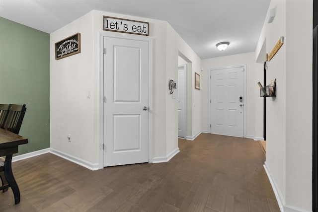 121 Sawmill Forest Ct, Saint Augustine, FL 32086 - corridor featuring baseboards and wood finished floors