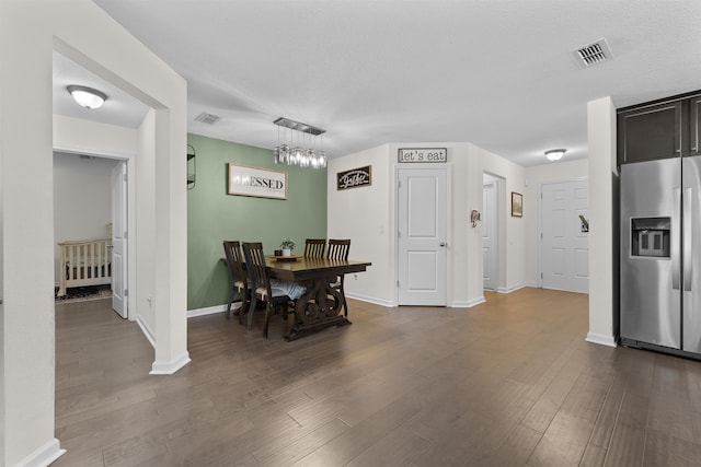 121 Sawmill Forest Ct, Saint Augustine, FL 32086 - dining space featuring baseboards, dark wood-style floors, and visible vents