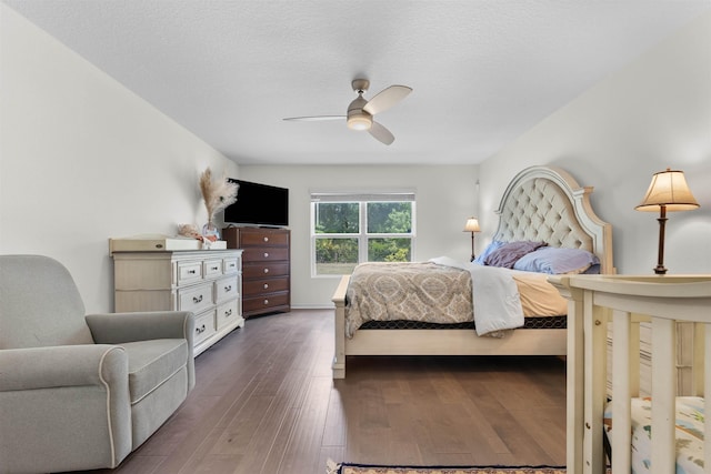 121 Sawmill Forest Ct, Saint Augustine, FL 32086 - bedroom featuring a textured ceiling, ceiling fan, and dark wood finished floors