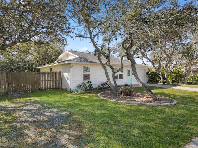 view of side of home featuring a lawn