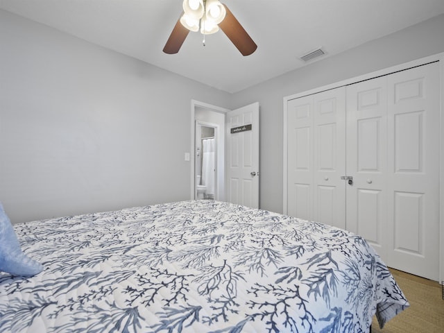 bedroom with ceiling fan and a closet