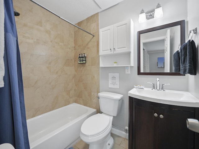 full bathroom with tile patterned floors, vanity, shower / tub combo, and toilet