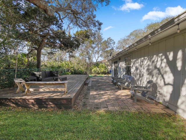 view of yard featuring an outdoor living space and a deck