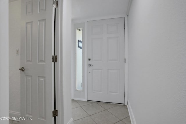 interior space with light tile patterned floors