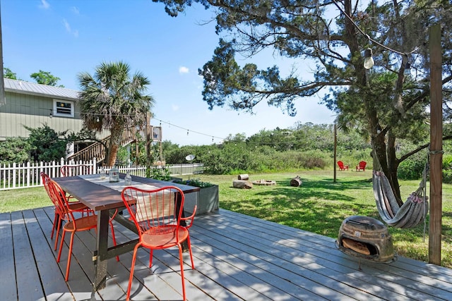 29 Oak St, Saint Augustine, FL 32084 - wooden terrace with outdoor dining area