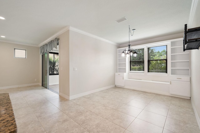 tiled spare room with built in features, an inviting chandelier, plenty of natural light, and crown molding