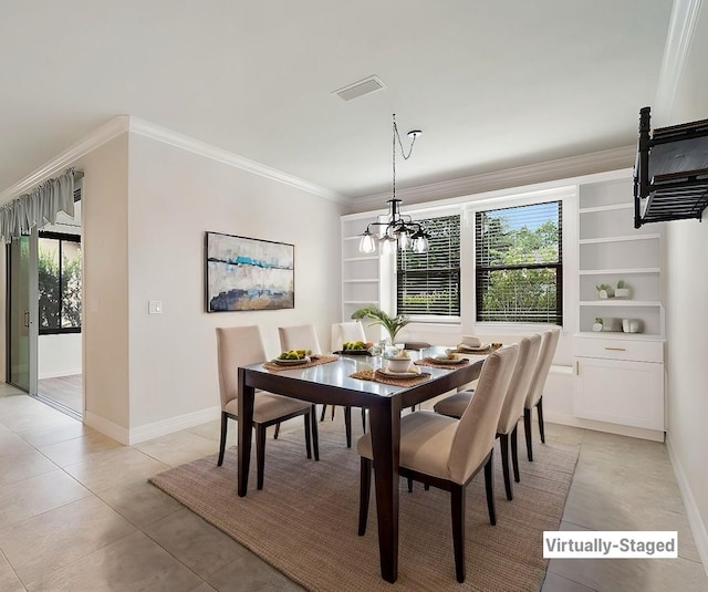 dining area featuring a chandelier, baseboards, ornamental molding, and plenty of natural light
