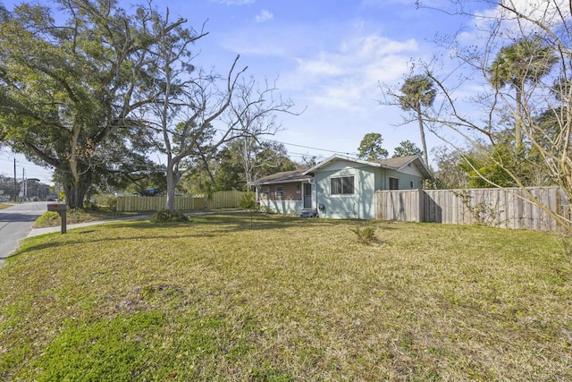 view of yard featuring fence