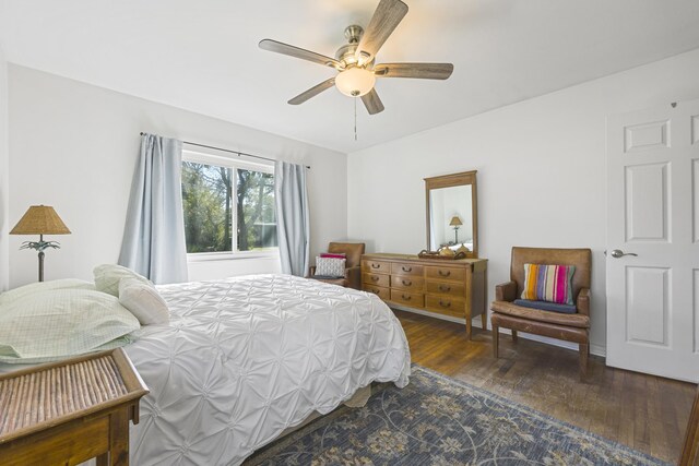 bedroom with ceiling fan and wood finished floors