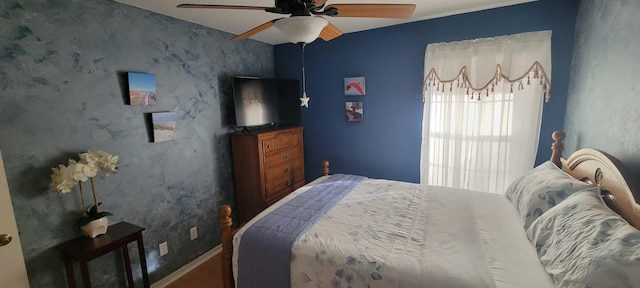 bedroom featuring ceiling fan