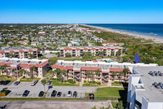 aerial view featuring a view of the beach and a water view