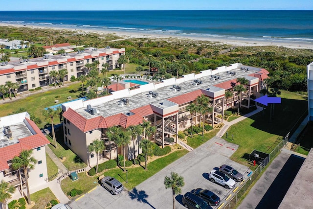 bird's eye view with a view of the beach and a water view