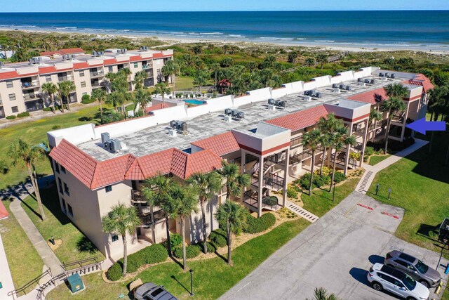 aerial view featuring a water view and a view of the beach