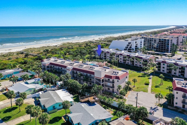 aerial view featuring a water view and a beach view