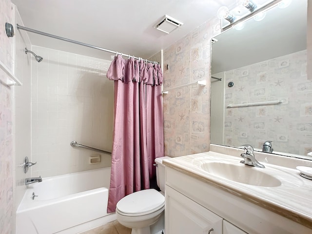 full bathroom with tile patterned flooring, vanity, shower / tub combo, and toilet