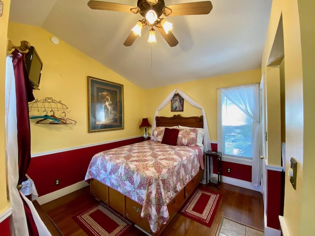 bedroom featuring ceiling fan and lofted ceiling