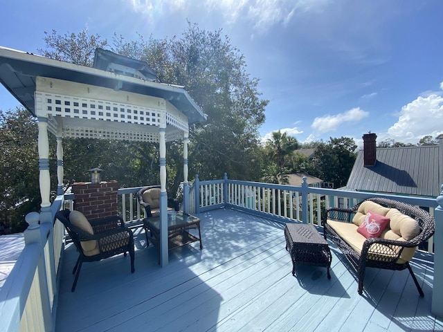 deck featuring an outdoor living space