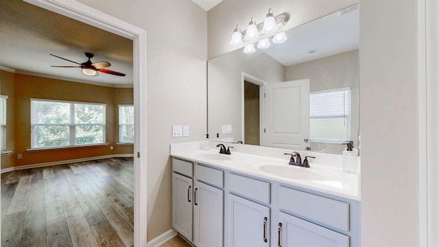 61 Grey Hawk Dr, Saint Augustine, FL 32092 - full bathroom with double vanity, ceiling fan, wood finished floors, and crown molding
