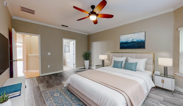 61 Grey Hawk Dr, Saint Augustine, FL 32092 - bedroom with wood finished floors, ornamental molding, ensuite bath, and a ceiling fan