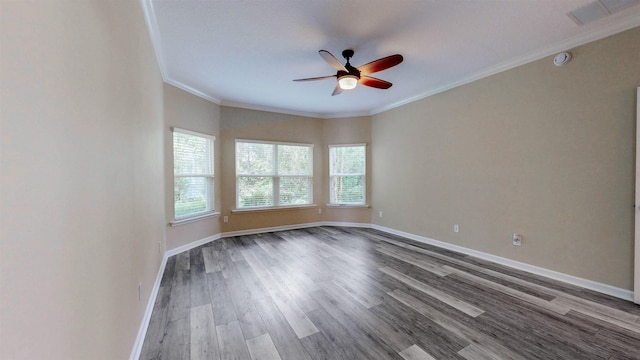 61 Grey Hawk Dr, Saint Augustine, FL 32092 - empty room featuring a ceiling fan, dark wood-style flooring, ornamental molding, and a smoke detector