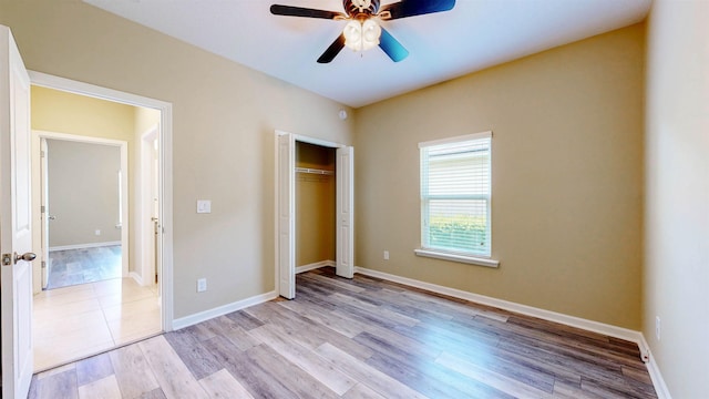 61 Grey Hawk Dr, Saint Augustine, FL 32092 - unfurnished bedroom featuring light wood finished floors, a closet, and a ceiling fan