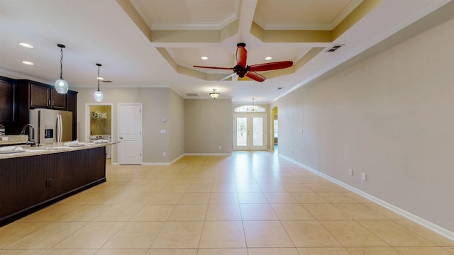 61 Grey Hawk Dr, Saint Augustine, FL 32092 - kitchen featuring stainless steel fridge, crown molding, a ceiling fan, open floor plan, and dark brown cabinets