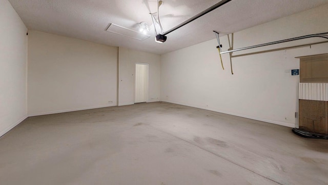 61 Grey Hawk Dr, Saint Augustine, FL 32092 - garage with a garage door opener and baseboards