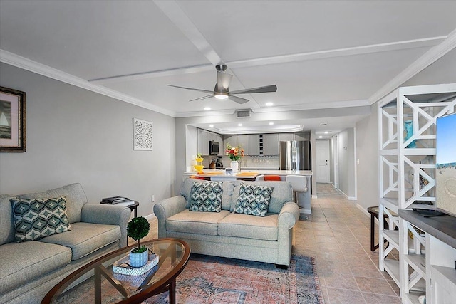 tiled living room with crown molding and ceiling fan