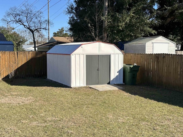 view of outdoor structure with a yard