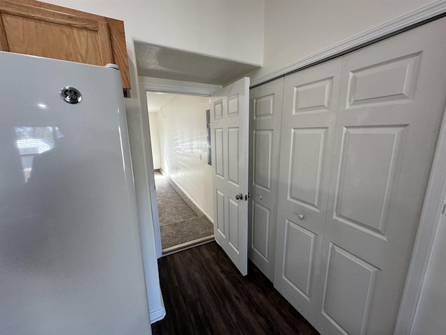 corridor with dark wood-type flooring