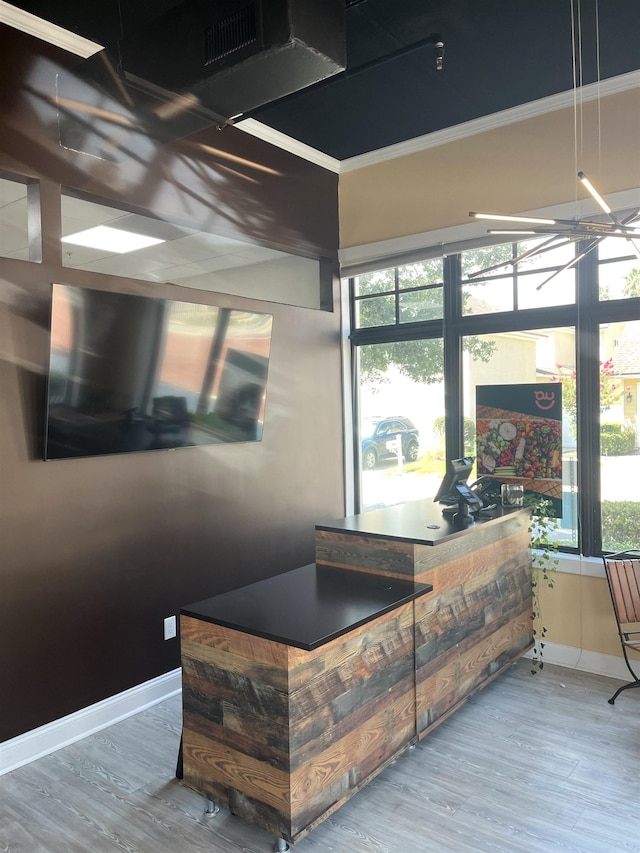 654 Market St, Commercial Space St, Saint Augustine, FL 32095 - detailed view of wood finished floors, ornamental molding, and baseboards
