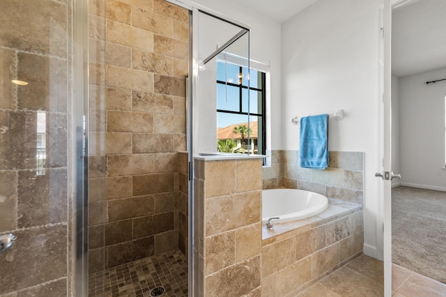654 Market St, Commercial Space St, Saint Augustine, FL 32095 - full bathroom with a shower stall, a garden tub, and baseboards