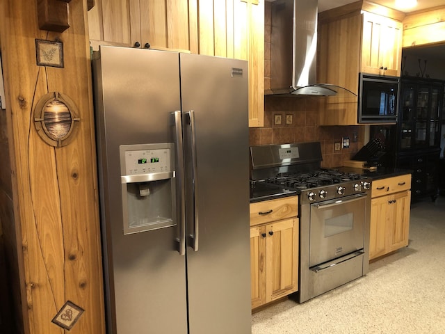 33 Camellia Dr, Ormond Beach, FL 32176 - kitchen featuring stainless steel appliances, wall chimney exhaust hood, dark countertops, and tasteful backsplash
