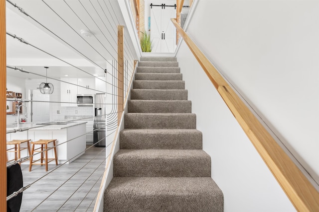 staircase with tile patterned flooring