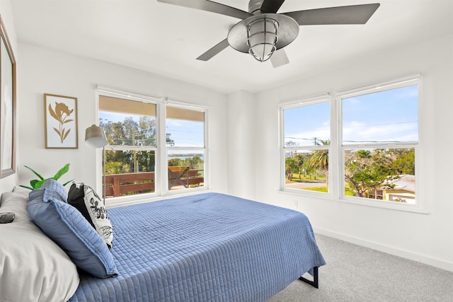 bedroom featuring ceiling fan and carpet flooring