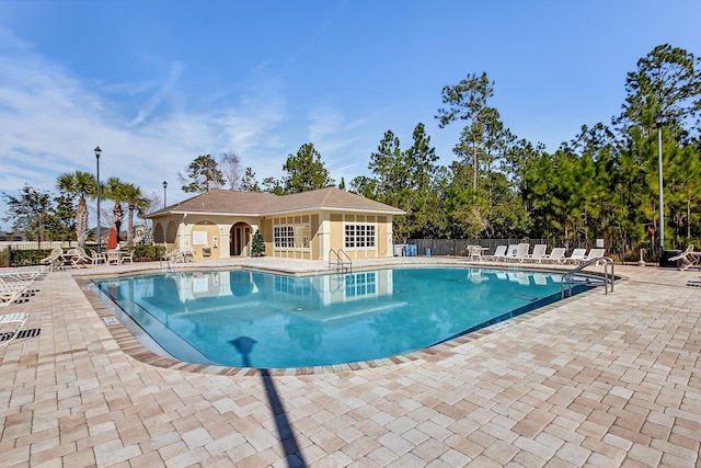 view of pool featuring a patio