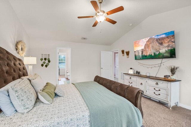 bedroom featuring carpet flooring, vaulted ceiling, and ceiling fan