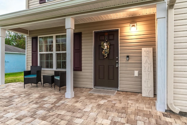 property entrance with a porch