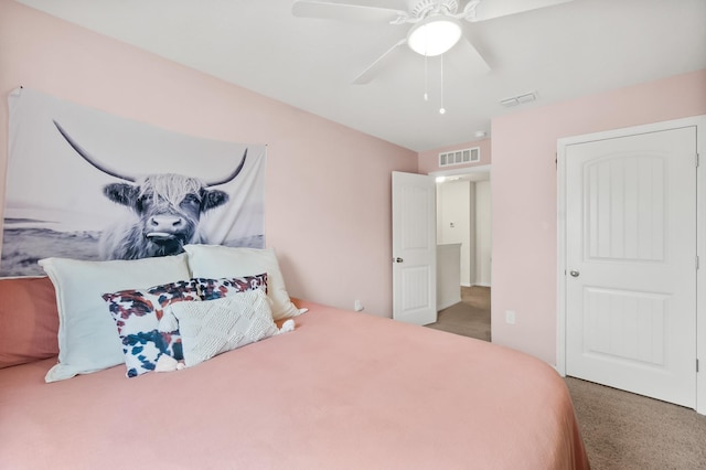 carpeted bedroom featuring ceiling fan