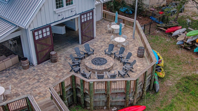 view of patio featuring an outdoor fire pit