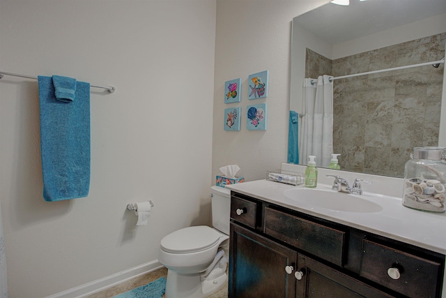 bathroom with walk in shower, vanity, and toilet