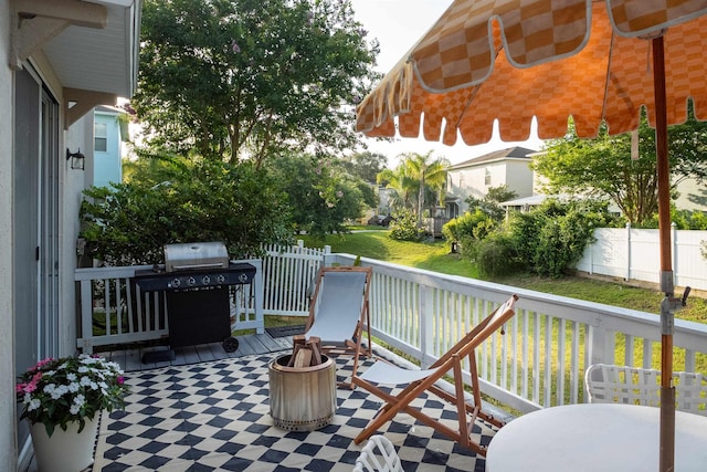 105 Serenity Bay Blvd, Saint Augustine Beach, FL 32080 - view of patio featuring a grill, a deck, and a fire pit