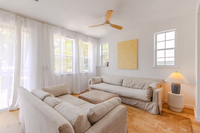 105 Serenity Bay Blvd, Saint Augustine Beach, FL 32080 - living area featuring healthy amount of natural light, ceiling fan, and light wood finished floors