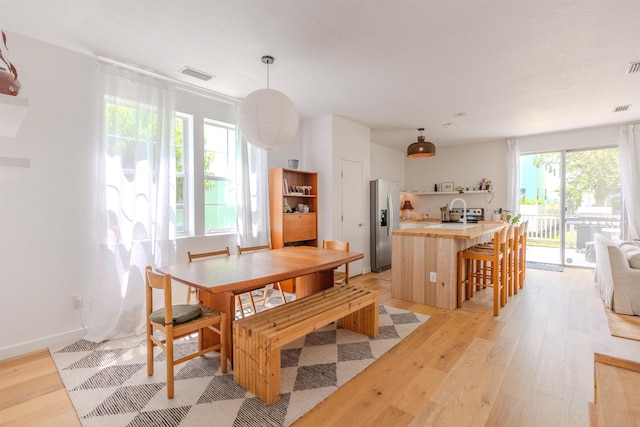 105 Serenity Bay Blvd, Saint Augustine Beach, FL 32080 - dining area featuring light wood-style floors and baseboards