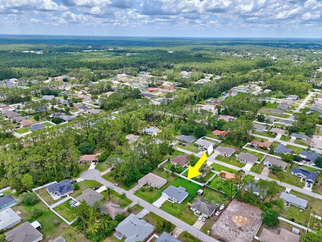 10 Reine Pl, Palm Coast, FL 32164 - aerial overview of property's location featuring nearby suburban area and a heavily wooded area